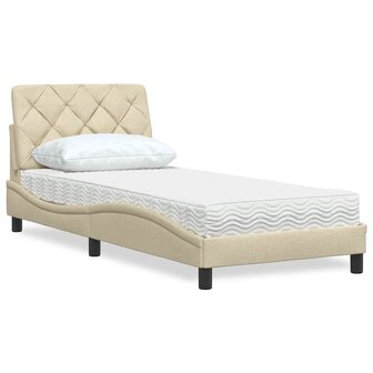 Bed met matras stof cr&egrave;mekleurig 90x190 cm 1